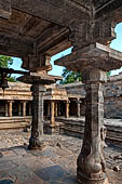 The great Chola temples of Tamil Nadu - The Airavatesvara temple of Darasuram. The peripheral columns of the  mandapa with seated yalis at the base. 